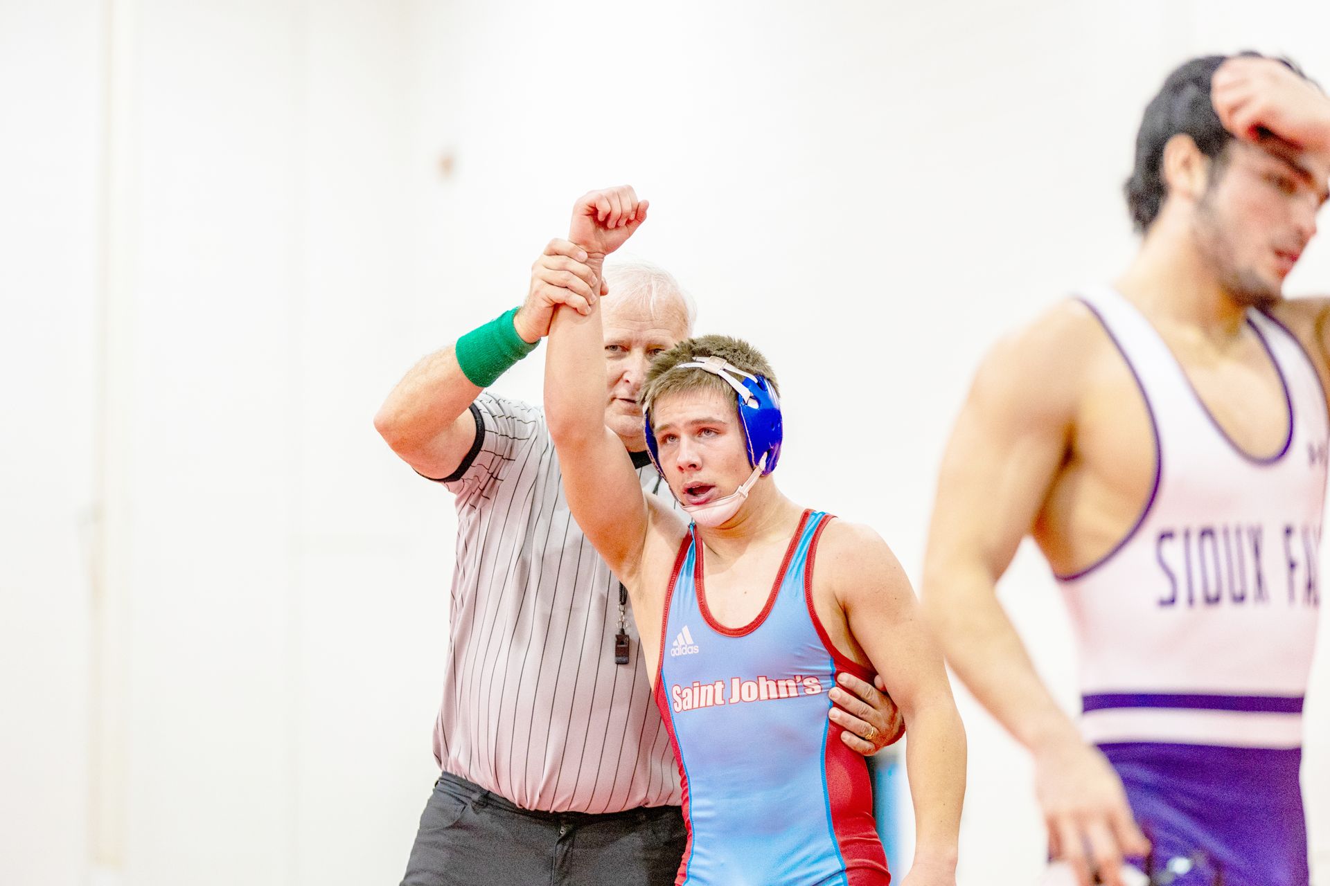 Herbst sets SJU wrestling record in win over Minnesota West C.T.C.